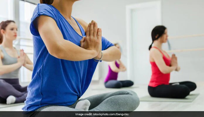 Try These Yoga Stretches to Reduce Pain